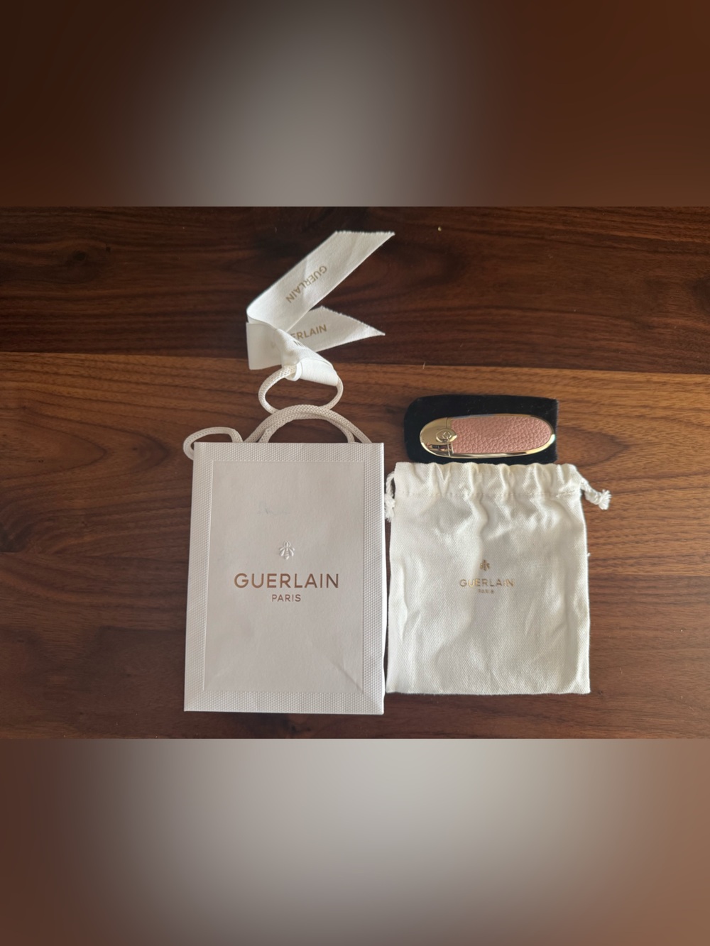 GUERLAIN Pink lipstick case and carrying bag